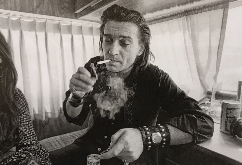 Annie Liebowitz, "Dripping Springs Reunion," Dripping Springs, Texas, 1972. Waylon Jennings