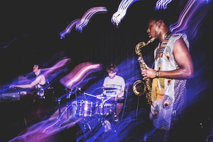 Trust In The Lifeforce Of The Deep Mystery, by The Comet is Coming, is reviewed at Riot Material magazine.