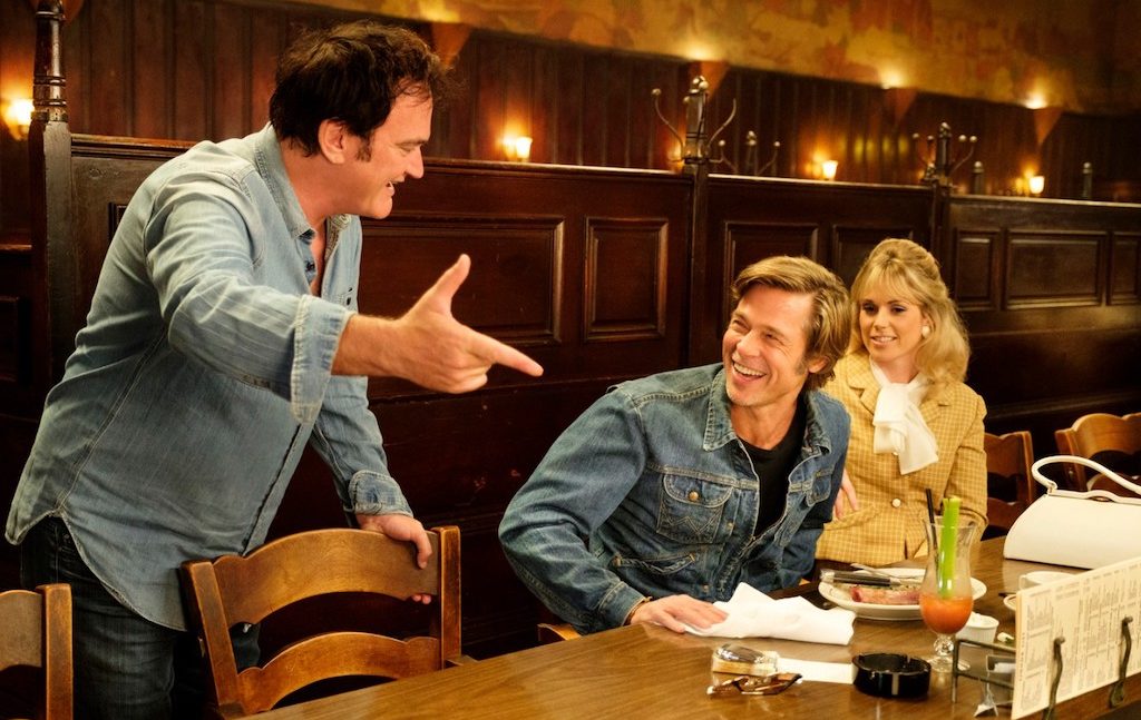 Quentin Tarantino on the set of Once Upon A Time In...Hollywood, reviewed at Riot Material magazine.