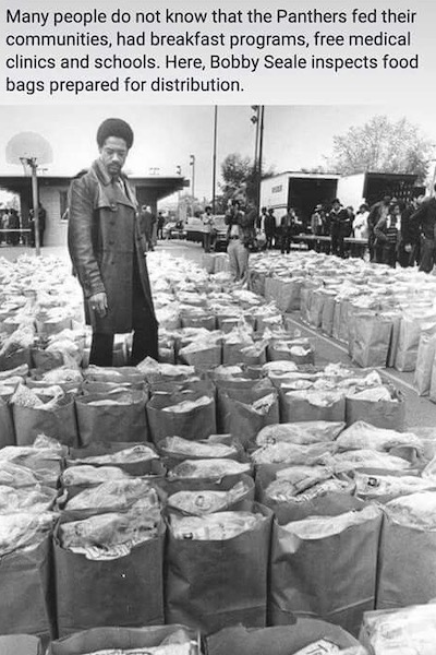Bobby Seale Checks Food Bags. March 31, 1972. Photo by Howard Erker.